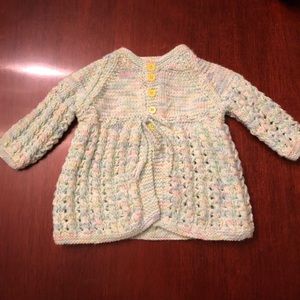 Baby girl sweater made by my aunt